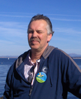 Owner Tom Bunting 
	Standing at Monterey Bay